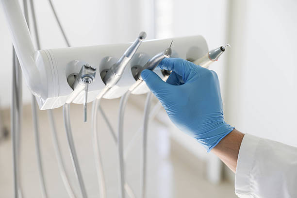 Professional Emergency Dentist technician working in Findlay, OH